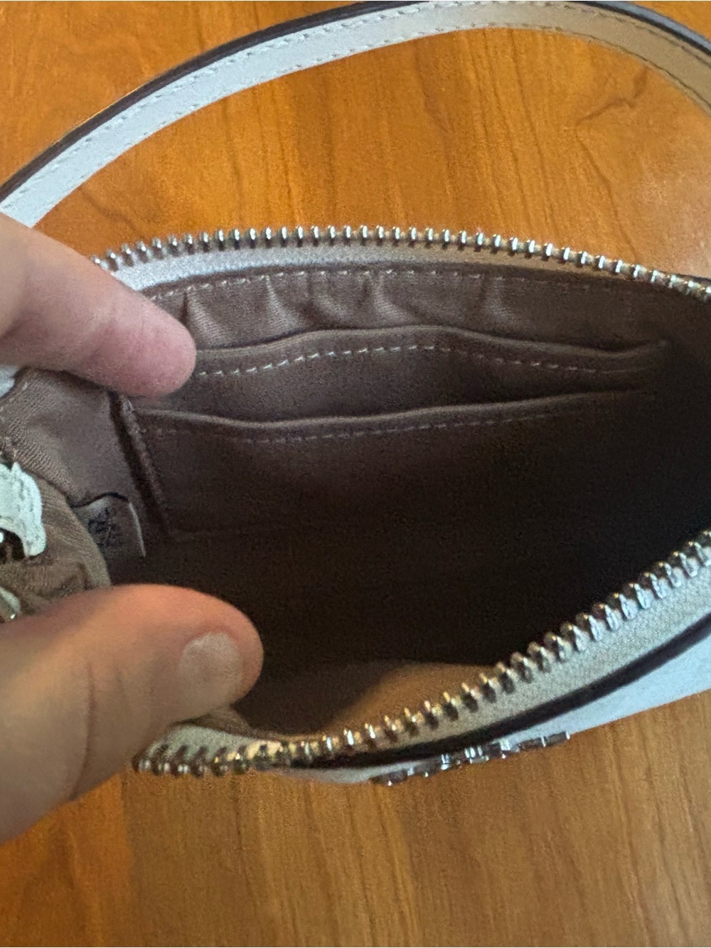 Coach White Signature Wristlet with Silver Hardware. - Picture 4 of 5
